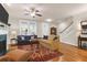 Inviting living room featuring hardwood floors, fireplace, and comfortable seating at 1243 Appling Dr, Mount Pleasant, SC 29464