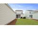 Spacious backyard with a screened-in porch and detached garage at 131 Lilac Grove Way, Summerville, SC 29486