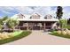 Charming pool pavilion with an open-air design, complemented by landscaping and a nearby brick walkway at 131 Lilac Grove Way, Summerville, SC 29486