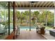 Open back porch with pool and palm tree views at 1412 Jackson St, Mount Pleasant, SC 29464