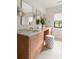 Bright bathroom featuring double vanity with marble countertop and modern fixtures at 1412 Jackson St, Mount Pleasant, SC 29464