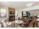 Spacious living room with a fireplace, hardwood floors, and an open layout connecting to the kitchen at 1412 Jackson St, Mount Pleasant, SC 29464