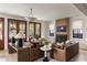 Comfortable living area with a fireplace, hardwood floors, and beautiful french doors leading to a patio at 1412 Jackson St, Mount Pleasant, SC 29464