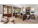 Bright living room with wood floors, fireplace, and exposed wood beams at 1412 Jackson St, Mount Pleasant, SC 29464
