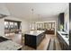The open floor plan features hardwood flooring, lots of natural light, kitchen island and adjacent Gathering room at 1412 Jackson St, Mount Pleasant, SC 29464