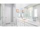Elegant bathroom with a double vanity, large mirror, and glass-enclosed shower at 1431 Clay Field Trl, Summerville, SC 29485