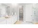 Bright bathroom with double vanity, marble floors, and a modern walk-in shower at 1433 Clay Field Trl, Summerville, SC 29485