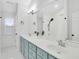 Elegant bathroom with a double vanity, modern fixtures, and a full-length mirror at 144 Jupiter Ln, Summerville, SC 29483