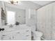 Bright bathroom featuring modern fixtures, ample storage, and a stylish shower curtain at 144 Jupiter Ln, Summerville, SC 29483