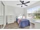 Charming bedroom featuring natural light, modern ceiling fan, and sleek floors at 144 Jupiter Ln, Summerville, SC 29483