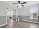 Stylish bedroom with modern ceiling fan, natural light, and sleek floors at 144 Jupiter Ln, Summerville, SC 29483