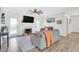 Inviting living room featuring a fireplace, tv, and access to an outdoor patio, perfect for relaxing and entertaining at 144 Jupiter Ln, Summerville, SC 29483