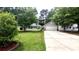 Charming single-Gathering home with well-manicured lawn, and a two-car garage at 148 Jupiter Ln, Summerville, SC 29483