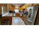 Modern kitchen with stainless steel appliances, wooden cabinets, and tile flooring at 148 Jupiter Ln, Summerville, SC 29483