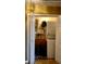 Compact laundry area offers a washer and dryer plus extra storage shelves for organization at 148 Jupiter Ln, Summerville, SC 29483