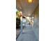 Inviting side porch featuring decorative hanging plants and an outdoor walkway at 148 Jupiter Ln, Summerville, SC 29483