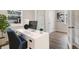 Cozy home office with a modern desk, comfortable chair, and bright natural light at 151 Threaded Fern St, Summerville, SC 29485