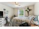Comfortable bedroom featuring a ceiling fan and bright window for natural light and air flow at 161 Brittondale Rd, Summerville, SC 29485