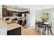 Dining area with tile floors adjacent to the kitchen with stainless steel appliances at 161 Brittondale Rd, Summerville, SC 29485