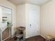 Hallway featuring carpet, a cat tree, and a closed door at 161 Brittondale Rd, Summerville, SC 29485