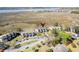 Aerial view of townhouses surrounded by lush greenery and scenic views, near water at 165 River Breeze Dr, Charleston, SC 29407