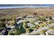 Gorgeous aerial view of waterfront community with marsh views, pool, tennis court, and waterway access at 165 River Breeze Dr, Charleston, SC 29407