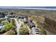 Aerial view of waterfront community, showcasing the beautiful setting and convenient access to nature and waterways at 165 River Breeze Dr, Charleston, SC 29407