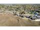 Aerial shot of a waterside community, highlighting the lush landscape, pool, and proximity to the waterway at 165 River Breeze Dr, Charleston, SC 29407