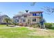 Inviting two-story townhouse showcasing well-maintained landscaping and charming curb appeal at 165 River Breeze Dr, Charleston, SC 29407