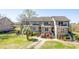 Attractive condo exterior with well-maintained landscaping and a welcoming walkway, enhancing the property's charm at 165 River Breeze Dr, Charleston, SC 29407