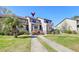 Charming townhome with well-manicured landscaping and inviting entrance, showcasing curb appeal and a welcoming atmosphere at 165 River Breeze Dr, Charleston, SC 29407