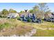 Scenic exterior of a townhouse with marsh views, decks, and natural landscaping at 165 River Breeze Dr, Charleston, SC 29407