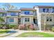 Charming condo exterior with beautiful landscaping and inviting entrance, creating a warm curb appeal at 165 River Breeze Dr, Charleston, SC 29407