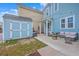 Cozy backyard featuring a patio with comfortable seating and a storage shed at 1656 Indy Dr, North Charleston, SC 29405