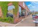 Exterior shot of EVO Craft Bakery with brick facade and lush greenery, a great location for food at 1656 Indy Dr, North Charleston, SC 29405