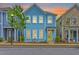 Charming two-story home with a bright yellow door and a cozy front porch at 1656 Indy Dr, North Charleston, SC 29405