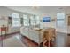 Bright living room with hardwood floors, cozy seating, and built-in storage at 1656 Indy Dr, North Charleston, SC 29405