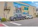 Charming building mural featuring a 'Welcome to New Bern' scene with parked cars at 1656 Indy Dr, North Charleston, SC 29405