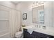 A bathroom with a shower/tub combo, toilet, and a vanity sink with mirror at 184 Clearblue Loop, Summerville, SC 29486