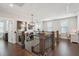 Hallway with wood floors, rod iron railing, and office area at the end at 184 Clearblue Loop, Summerville, SC 29486