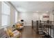 Upstairs landing area with a desk, and rod iron railing overlooking stairs at 184 Clearblue Loop, Summerville, SC 29486