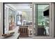 Comfortable outdoor patio through sliding glass doors with cozy seating and views of the backyard at 184 Clearblue Loop, Summerville, SC 29486