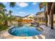 This property offers an incredible outdoor space featuring a pool, water feature, and mature palm trees for ultimate relaxation at 184 Clearblue Loop, Summerville, SC 29486