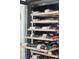 Climate-controlled wine storage unit with multiple shelves showcasing an impressive collection of wine bottles at 184 Clearblue Loop, Summerville, SC 29486