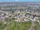 A beautiful aerial view showcases homes in a community with mature trees and manicured lawns at 2004 Hammond Dr, Mount Pleasant, SC 29466