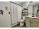 Quaint bathroom featuring a vanity, toilet and tub/shower combo. Decorated with wall art and fun figures at 2004 Hammond Dr, Mount Pleasant, SC 29466