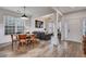 Elegant dining room featuring hardwood floors, modern decor, and seamless flow to the living spaces at 2004 Hammond Dr, Mount Pleasant, SC 29466