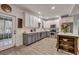 Bright kitchen features stainless appliances, two-tone cabinets and a butcher block island for extra prep and storage at 2004 Hammond Dr, Mount Pleasant, SC 29466