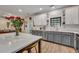 Updated kitchen features a stainless steel dishwasher, lots of cabinet space and marble countertops at 2004 Hammond Dr, Mount Pleasant, SC 29466