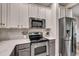 Modern kitchen is equipped with stainless steel appliances and lots of cabinet space at 2004 Hammond Dr, Mount Pleasant, SC 29466